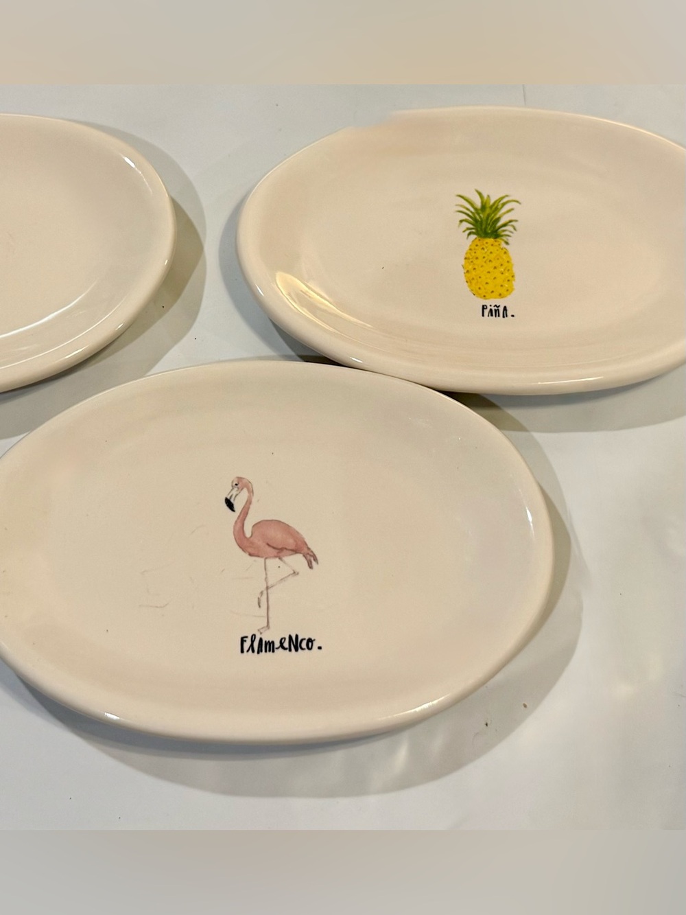 2 Rae Dunn oval plates. Pina & Flamenco. 8”x5.5”